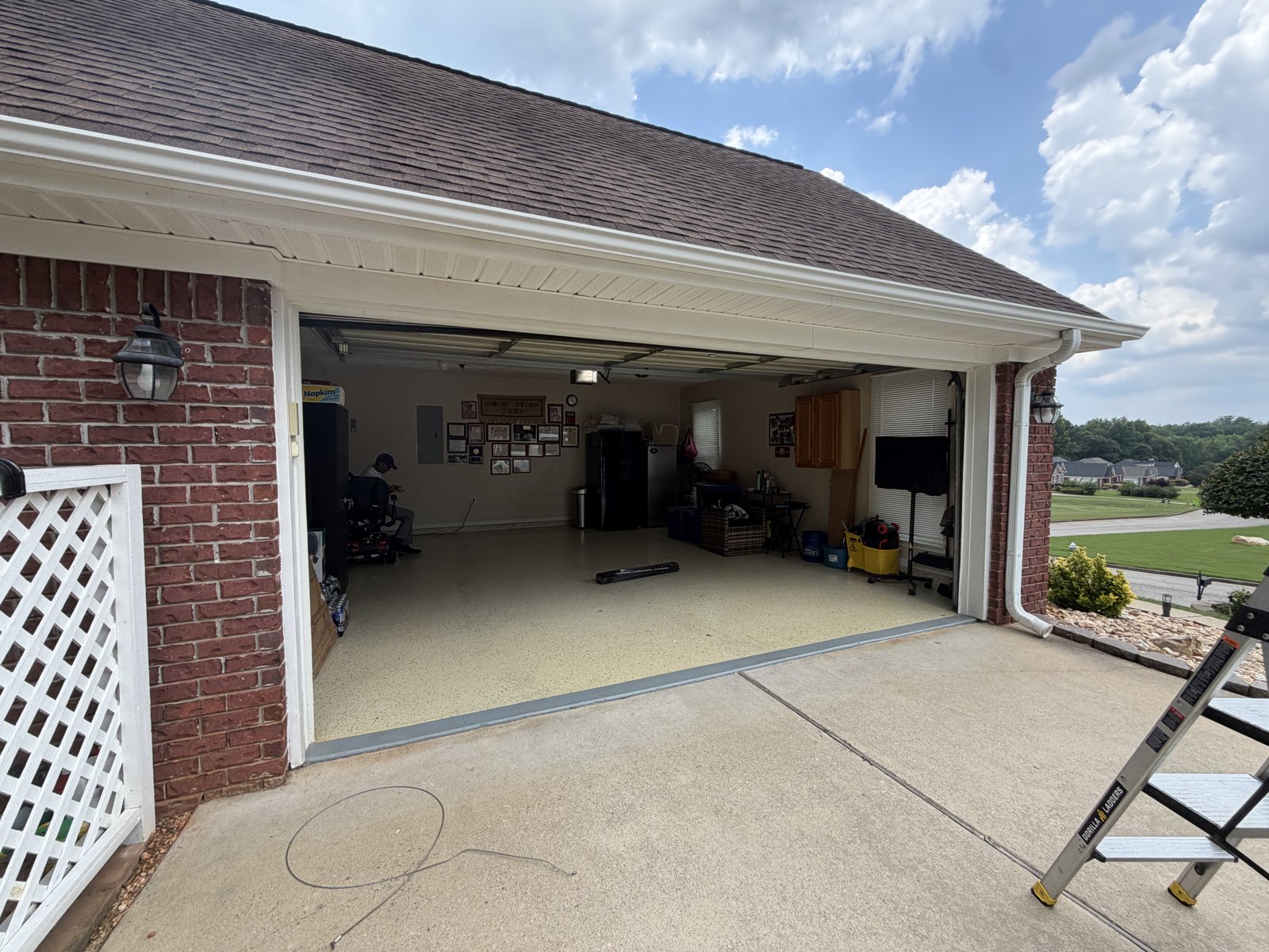 Garage cleared and ready for renovation Empty two-car garage interior cleared out before a renovation